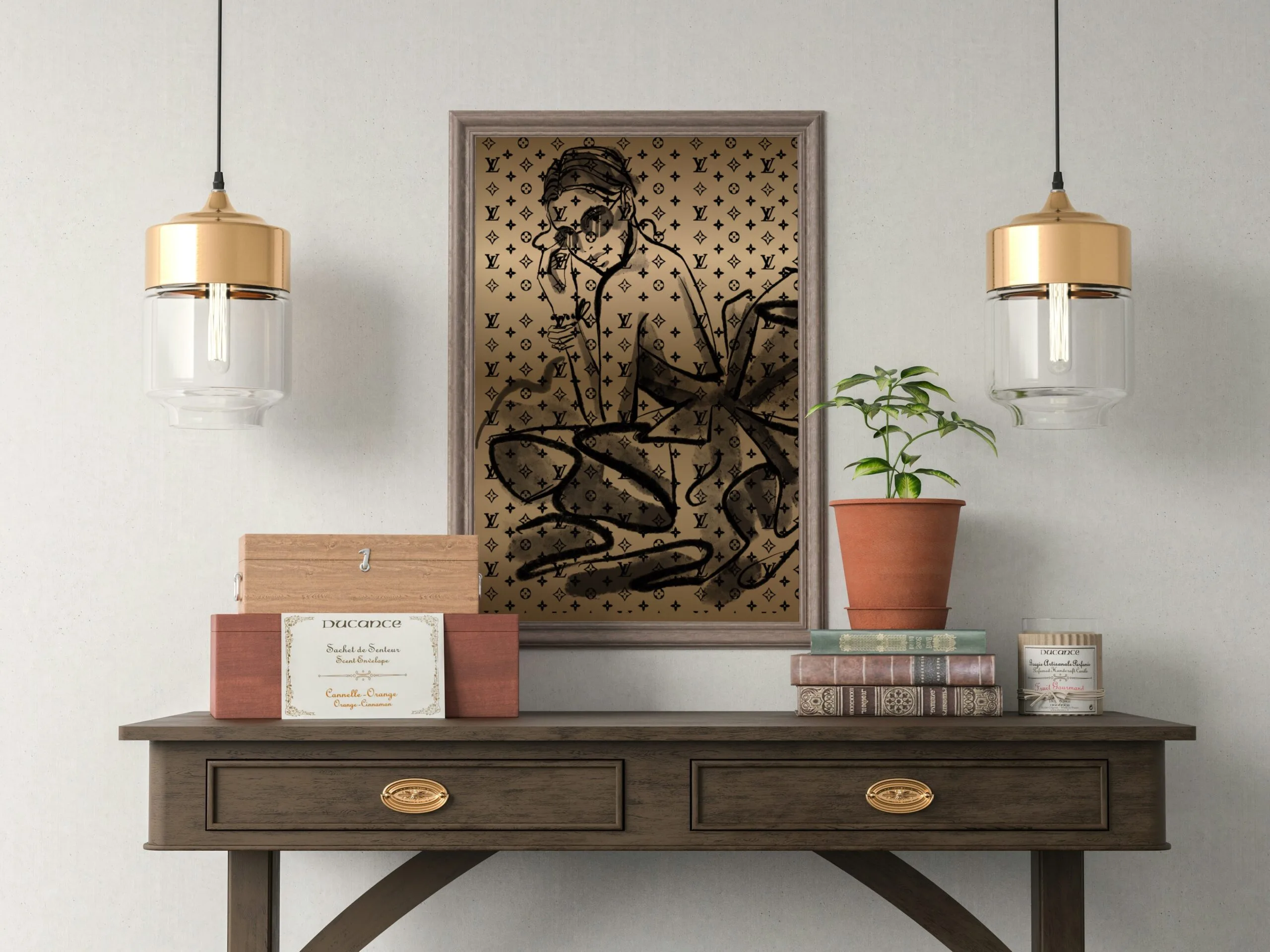 Tableau mural doré avec illustration artistique noire, accroché au-dessus d’une console en bois dans un intérieur élégant et moderne